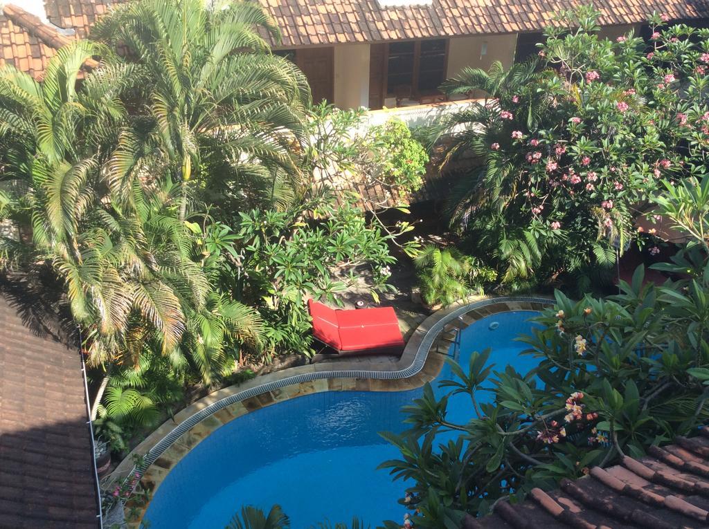 Secret Garden Inn กูตา ภายนอก รูปภาพ