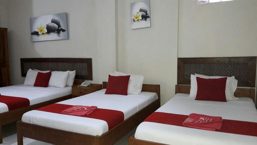 Secret Garden Inn กูตา ภายนอก รูปภาพ