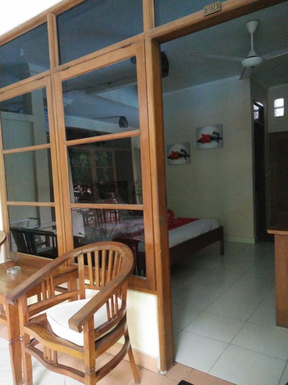 Secret Garden Inn กูตา ภายนอก รูปภาพ