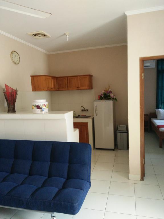 Secret Garden Inn กูตา ภายนอก รูปภาพ