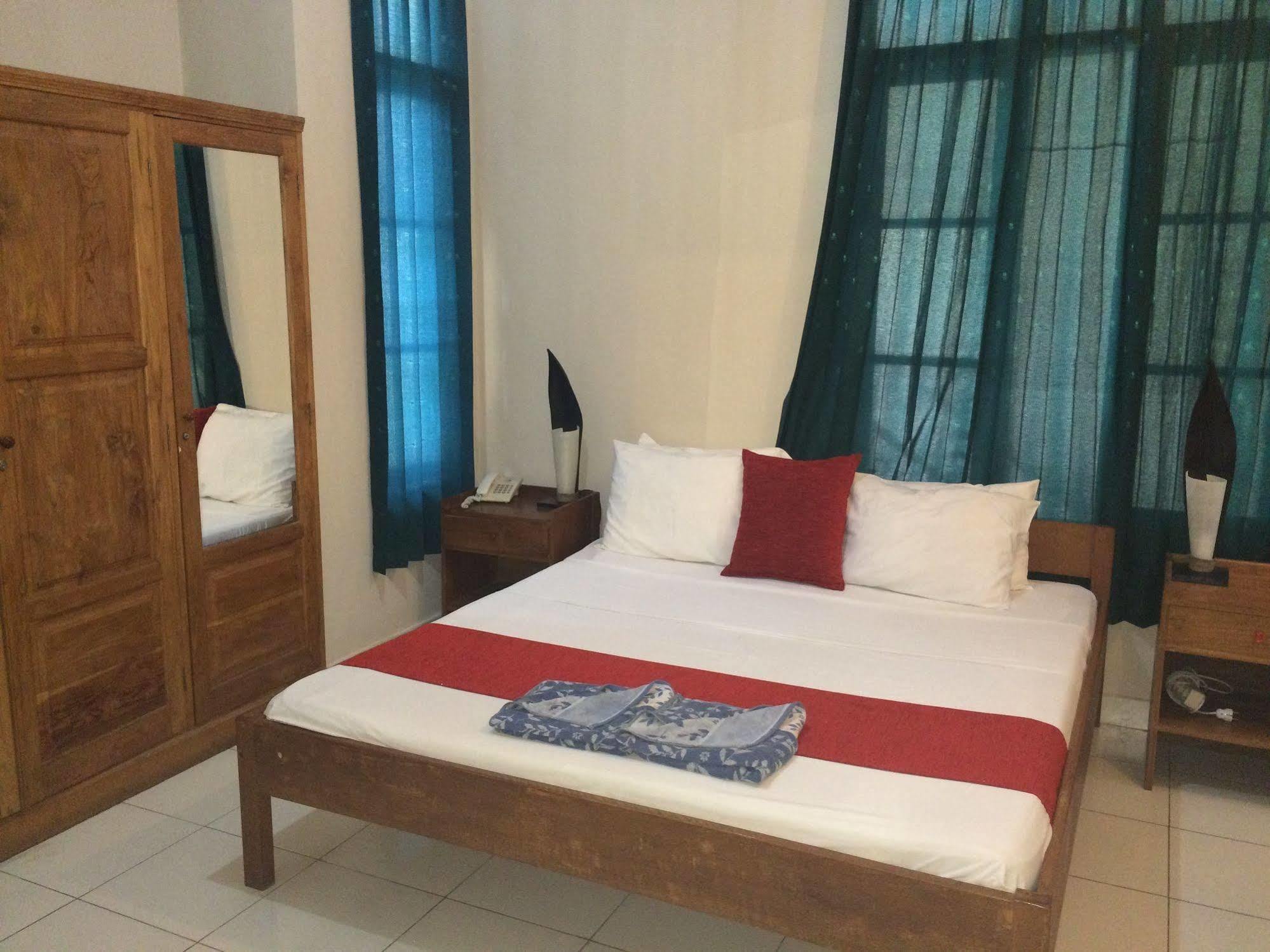 Secret Garden Inn กูตา ภายนอก รูปภาพ