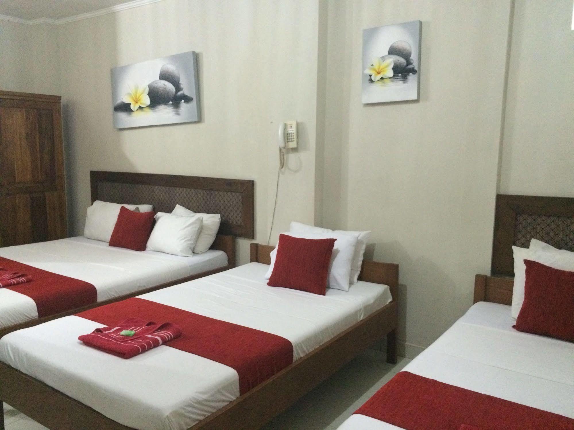 Secret Garden Inn กูตา ภายนอก รูปภาพ